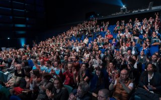 photo des personnes présentes dans l'auditorium