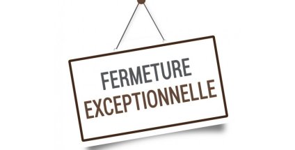 Image d'un panneau accroché avec un fil à un clou portant l'inscription "fermeture exceptionnelle"